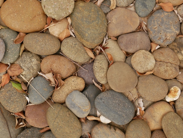 Foto fondo de piedra marrón sucio, piso de piedra