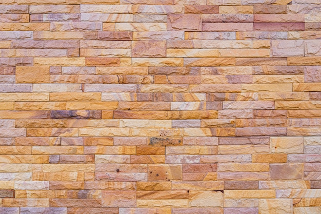 Fondo de piedra moderno de la pared de ladrillo.