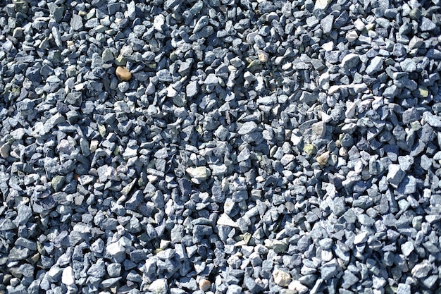 fondo de piedras pequeñas piedras grises en la textura del suelo para el fondo