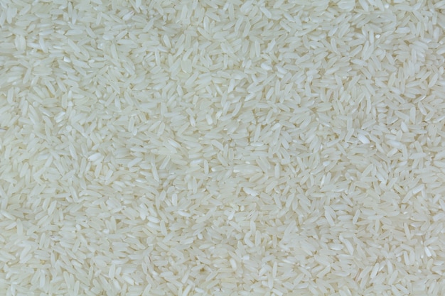 Foto fondo de pila de granos de arroz