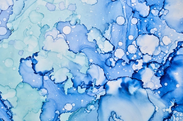 Fondo de pintura azul abstracta. Burbujas de agua gotas manchas salpicaduras textura patrón