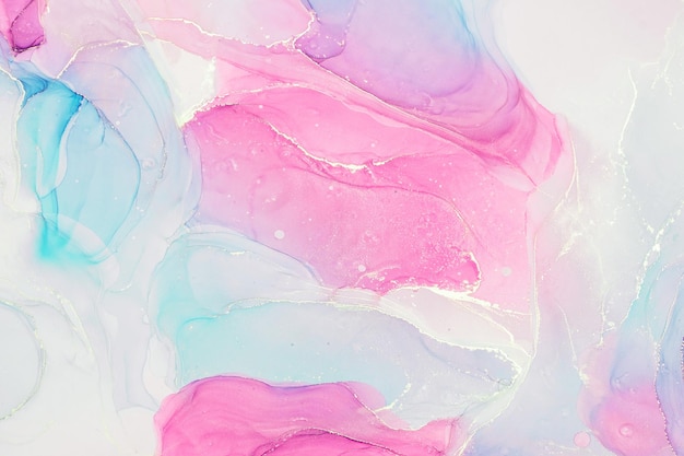 Fondo de pintura de tinta líquida abstracta en colores azul rosa