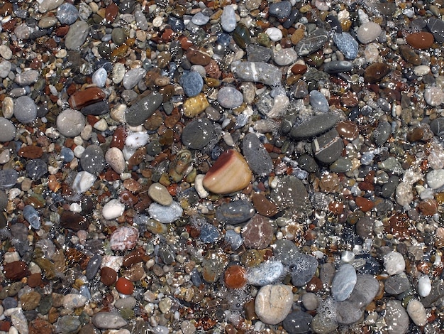 Fondo de playa de piedras