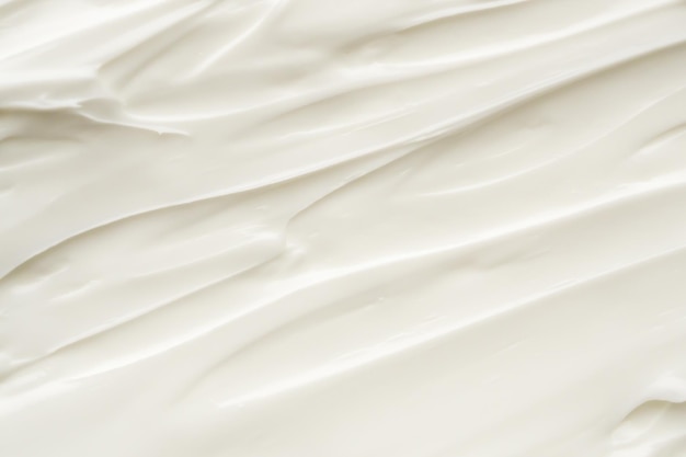 Fondo de producto cosmético de textura de crema para cuidado de la piel de belleza de loción blanca