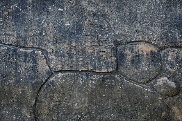 Fondo de roca negra agrietada