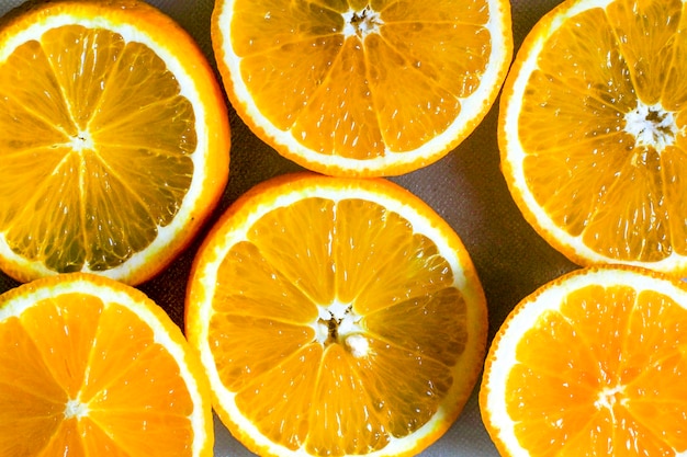 Fondo de rodaja de naranja para el verano. Fondo Con Cítricos De Rodajas De Naranja. Jugosa rodaja de naranja