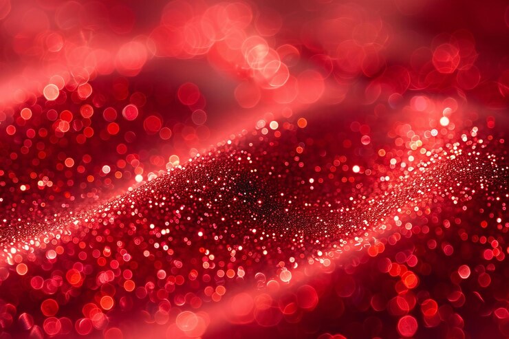 un fondo rojo con brillo y brillo