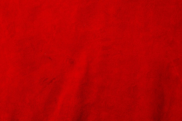 Fondo rojo mate de gamuza Textura de terciopelo de cuero sin costuras Textura de gamuza roja