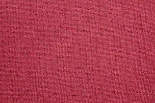 Fondo rojo de la trama de la textura de la tela de la ropa