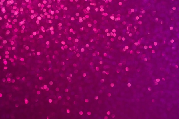 Fondo rosa abstracto. Hermoso efecto bokeh. Fondo de círculos de luz.