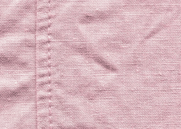 Fondo rosado de la textura del paño