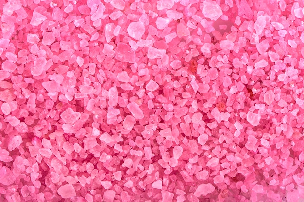 Fondo de sal de baño aromático rosa.