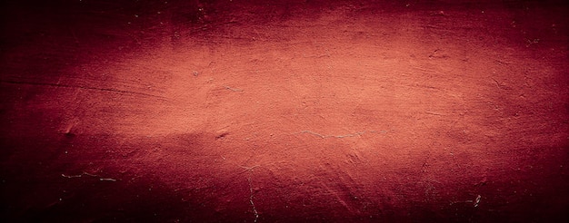 Fondo sucio de textura rojo oscuro de la antigua muralla