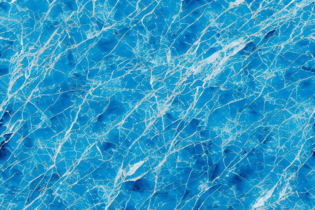 Fondo de superficie de mármol agrietado azul y blanco abstracto