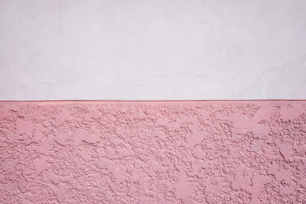 Foto fondo de la superficie de la pared rosa con suave y áspera.