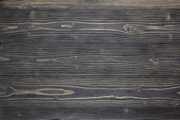 Fondo de la tabla de madera de Grunge. Sunface tablón de madera negro textura de fondo.