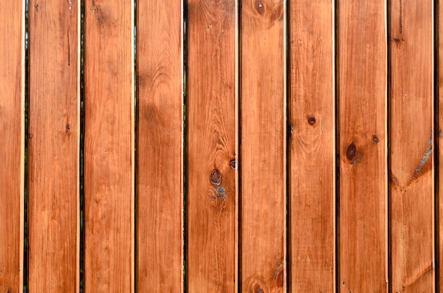 Fondo de tablas de madera de colores naturales.