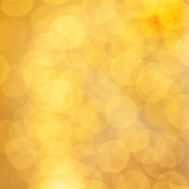 Fondo de tarjeta dorado con brillo bokeh abstracto