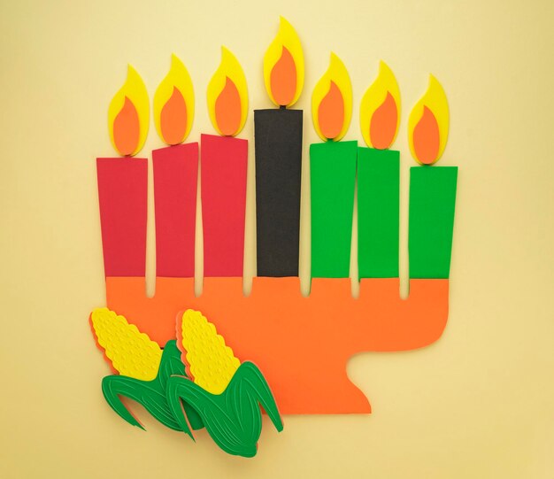 Fondo de tarjeta de felicitación de Kwanzaa feliz Portavelas hecho de hojas de papel Concepto de arte de papel