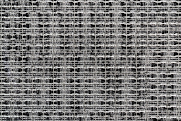 Fondo tecno abstracto con alambre de metal gris brillante entrelazado, primer plano