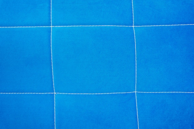 Fondo de tela azulfondo de tela azul con costuras