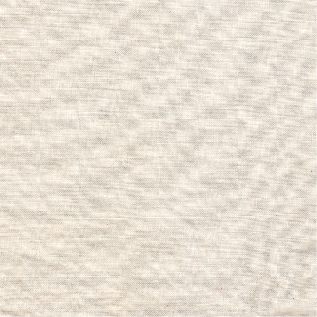 Fondo de tela blanca triturada, textura de tela crema