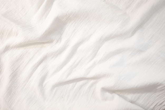 Fondo de tela Lienzo de lino blanco Tejido de algodón natural arrugado Fondo de vista superior de lino natural hecho a mano Textiles ecológicos orgánicos Textura de tela blanca