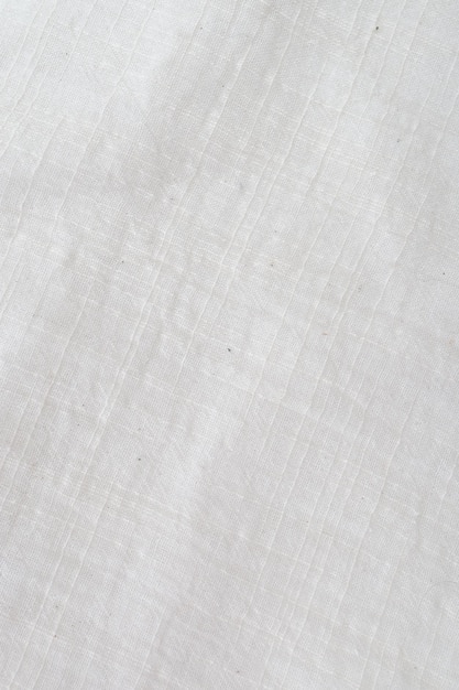 Fondo de tela Lienzo de lino blanco Tejido de algodón natural arrugado Fondo de vista superior de lino natural Textiles ecológicos orgánicos Textura de tela blanca