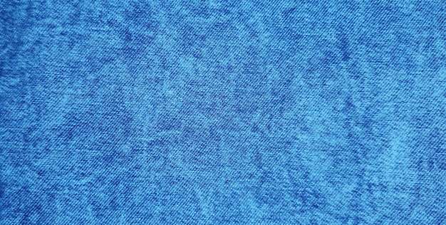 Fondo de tela de mezclilla azul índigo Tela de mezclilla azul fotografía de cerca tela de mezclilla