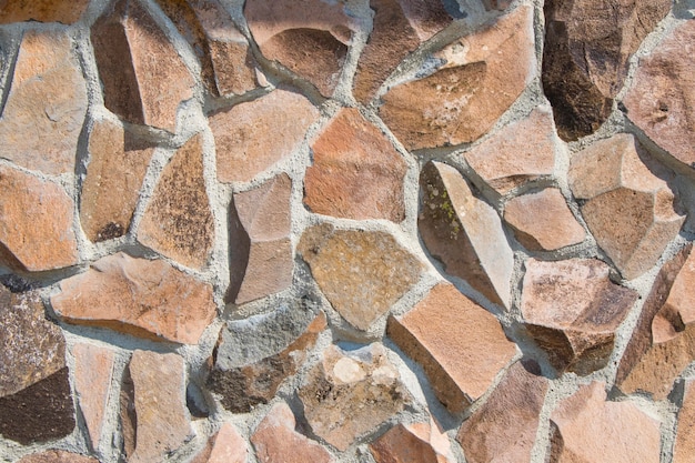 Fondo y telón de fondo de la pared de piedra, piedras antiguas