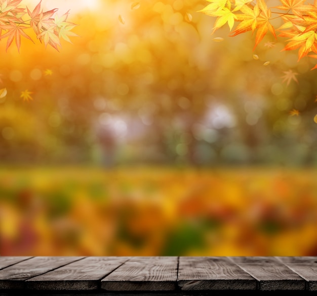 Fondo de temporada otoño y otoño con mesa de madera.