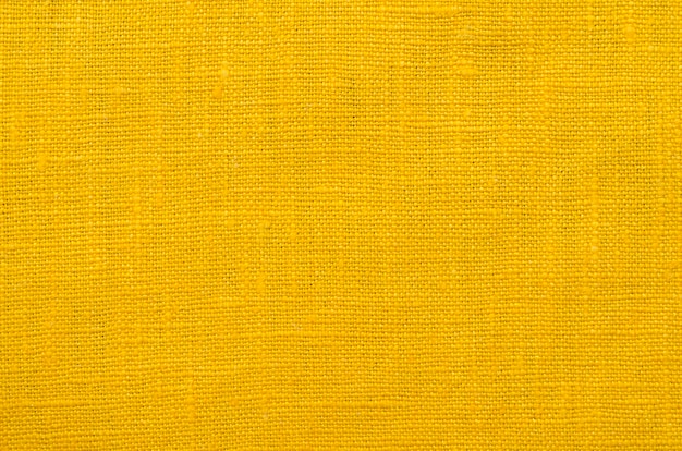 Fondo textil de lino amarillo muy detallado