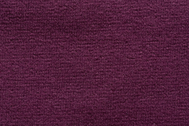 Fondo textil superlativo en color violeta oscuro