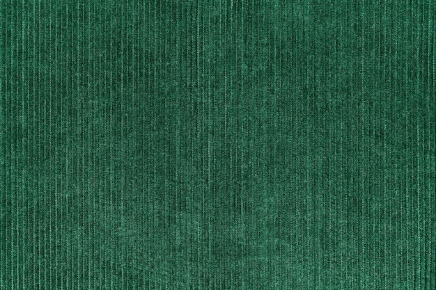 Fondo de textil verde de textura de tela de pana