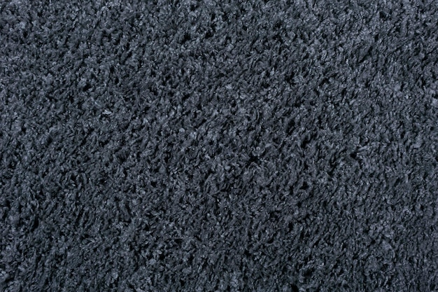 Fondo de textura de alfombra Alfombra de algodón gris negro para revestimientos de suelos Material para diseño de interiores y decoración de salas de estar Foto de alta calidad