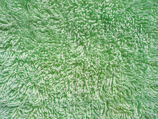 Fondo de textura de alfombra verde