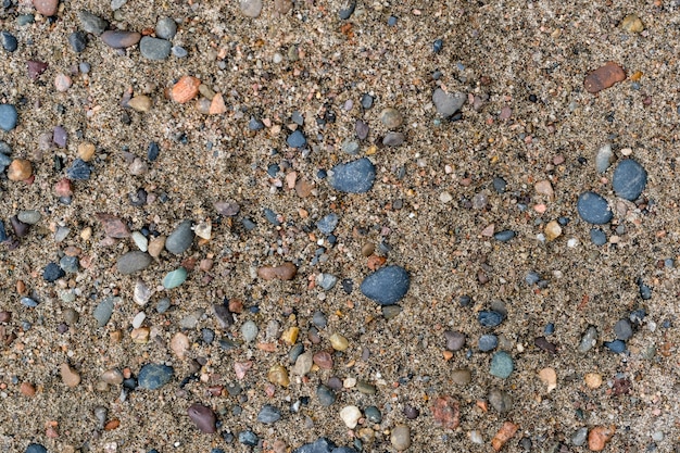 Fondo de textura de arena y rocas. Tonos de la naturaleza beige