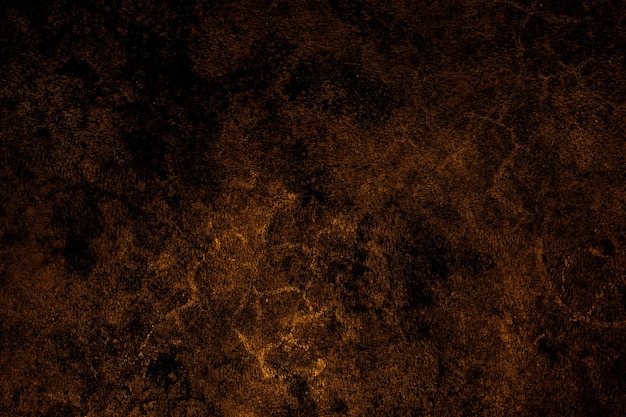 Fondo de textura áspera grunge de pared de yeso de cemento de color marrón brillante