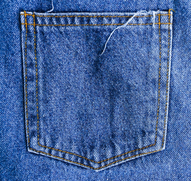 Fondo de textura de bolsillo de jeans azul con espacio en blanco