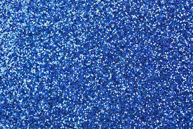 Fondo de textura de brillo azul, brillo o superficie muy detallada de papel de arena, concepto de efectos brillantes brillantes