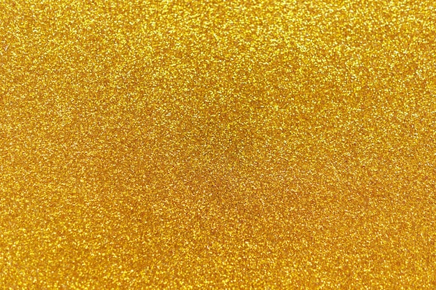 Fondo de textura de brillo brillo oro abstracto