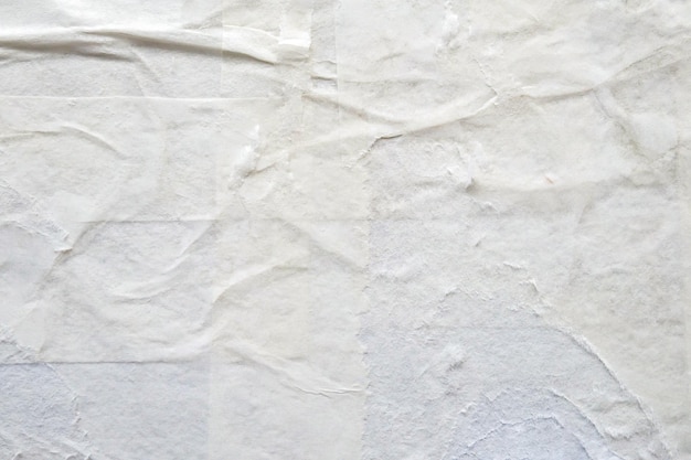 Foto fondo de textura de cartel de papel rasgado blanco en blanco