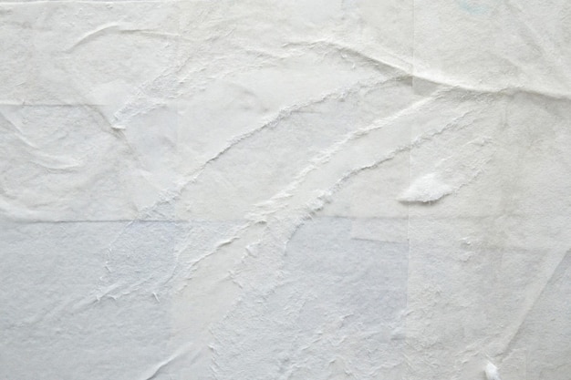 Fondo de textura de cartel de papel rasgado blanco en blanco