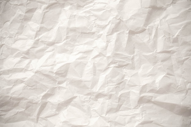 Fondo de textura de cerca de papel arrugado blanco