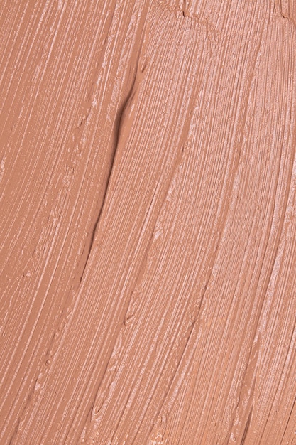 Foto fondo de textura de crema de belleza. frotis de loción hidratante de crema facial de color beige natural. concepto de producto cosmético para el cuidado de la piel