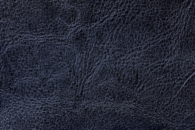 Fondo de textura de cuero azul marino oscuro, primer plano