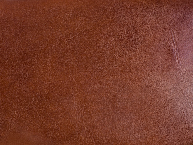Foto fondo de textura de cuero genuino de ganado marrón. fotografía macro
