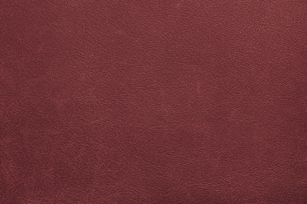 Fondo de textura de cuero rojo artificial natural genuino