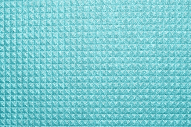 Fondo de textura de estera de yoga azul. fondo de alfombra de camping