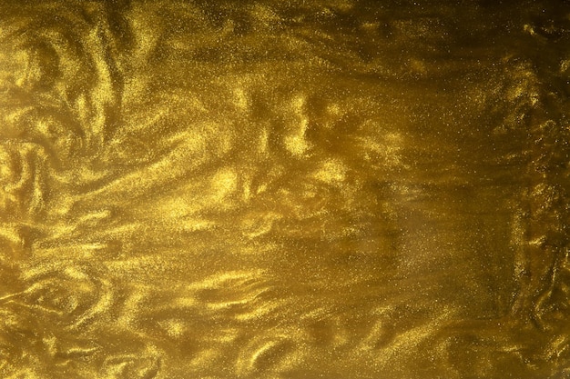 Fondo de textura de flujo líquido brillo dorado